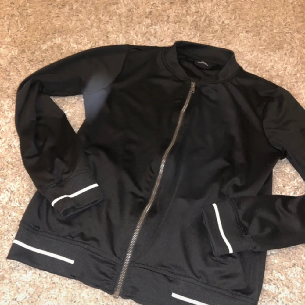 Black zip up worn a few times . Hoodies.