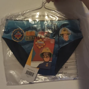 Nya Fireman Sam badbyxor för barn 3år storlek 98 - Nya Fireman Sam badbyxor för barn 3år  storlek 94/98  * Nya  * Hela  * Rena 