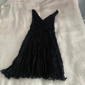 Svart klänning  - En svart klänning. Använd endast ett fåtal gånger. 