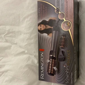 Remington Rotating Air Styler - Used 2-3 times only Brand: Remington  All parts are included 