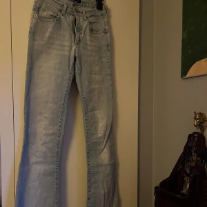 Bootcut ljusblåa jeans vintage - Vintage bootcut jeans stl 25/32 