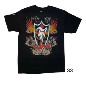 Fleshgear T-shirt  - Fleshgear T-Shirt i storlek M. Tröjan är helt ny. Mått: axelbredd - 49 cm, längd - 69 cm. Skriv för fler bilder och frågor!