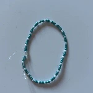 Pärlarmband  - Helt nytt ett fint armband 