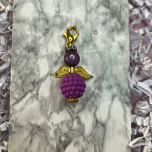 Lila och guld lyckoängel  - Lila och guld lyckoängel.