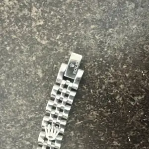 Rolex armband i nyskick. Rostfritt silver.   