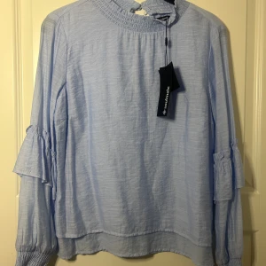 Bluse - En helt oanvänd  bluse som passar perfekt till sommaren