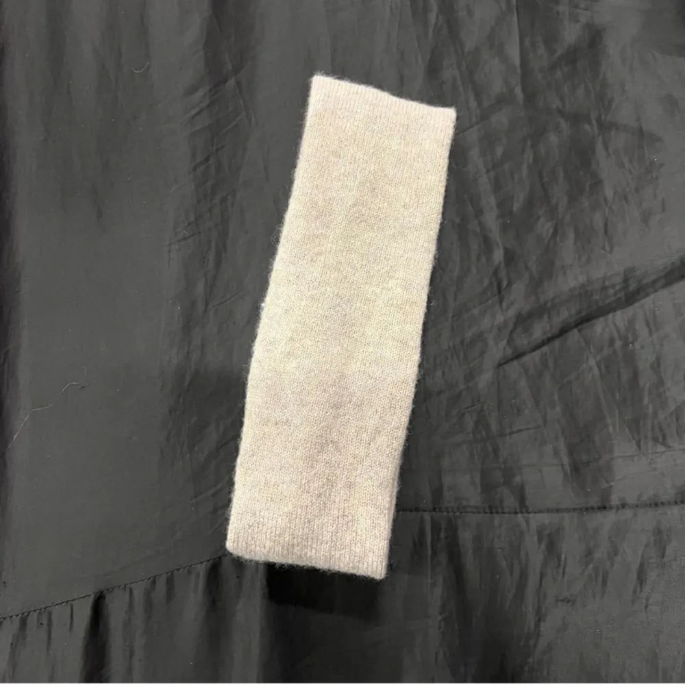 Pannband från kare uf i en brun/grå färg, 100%kashmir. Accessoarer.