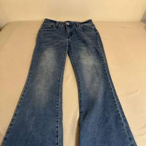 Blå jeans storlek M 