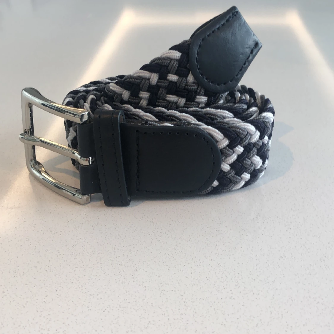 Flätat bälte grå mix