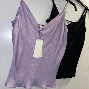 Sidenlinne - Säljer detta superfina linne i pastellila som är helt nytt med prislappen kvar i storlek XS.  Köptes ny för 299kr