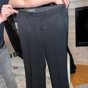 Kostym byxor  - Svarta kostym byxor som är i riktigt bra kvalite som är riktigt bra kvalite samt av märket Filippa K. 