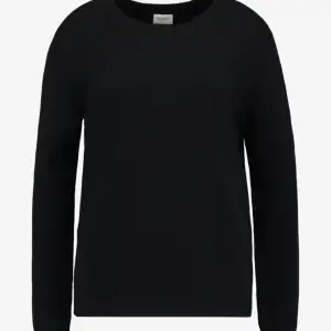 En svart stickad tröja från vila, Bra skick säljer för 110kr