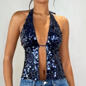 Mörkblå paljett-Set med glittrig look - Supersnyggt set,  täckt av stora glittriga paljetter som verkligen fångar ljuset. 