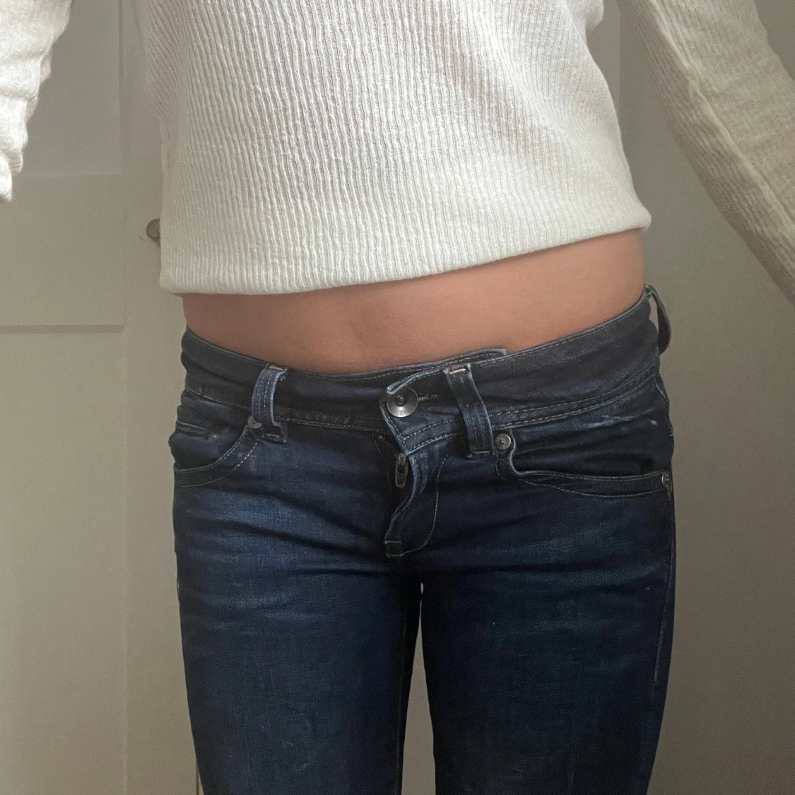 Mörkblå lågmidjade jeans från G-Star RAW