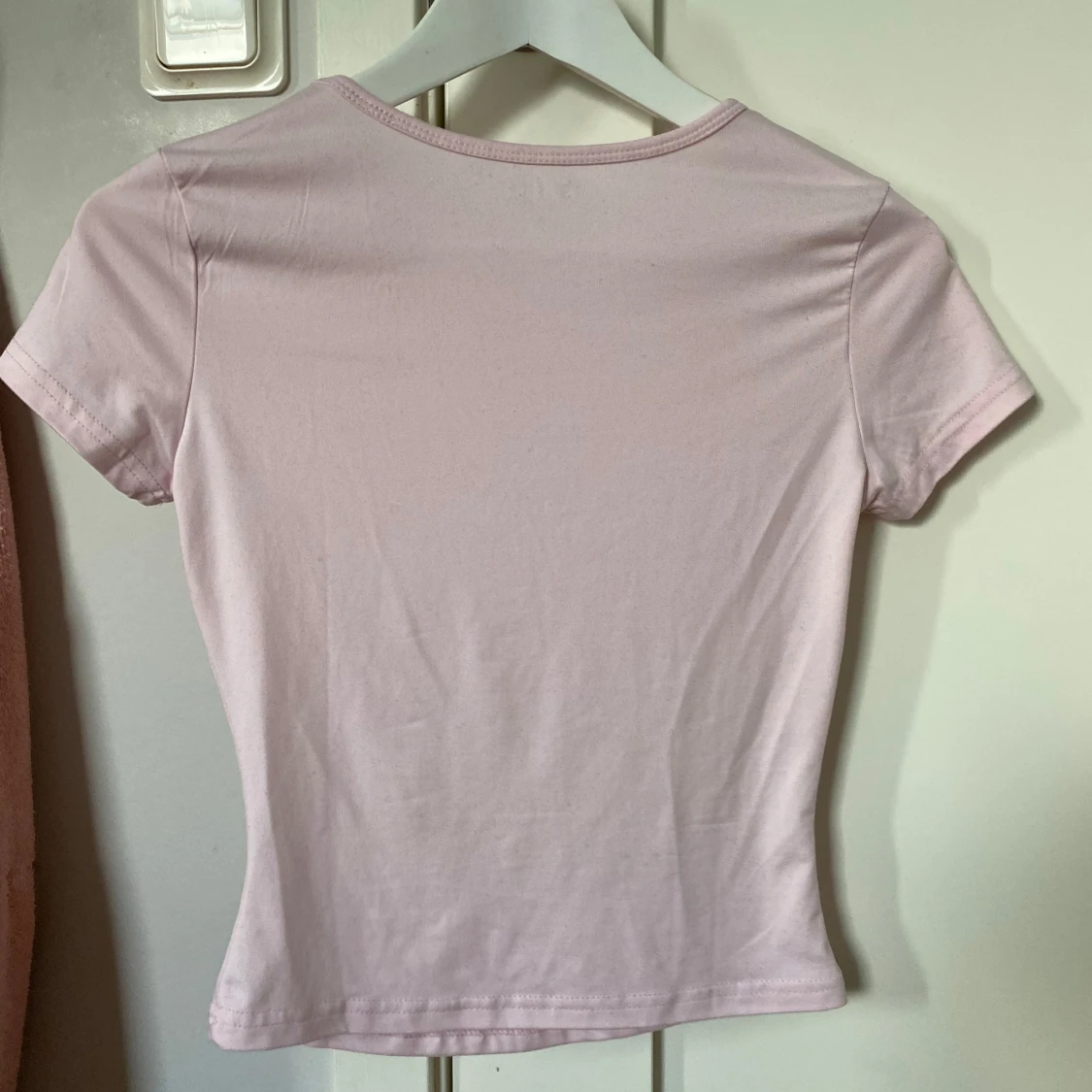 Ljusrosa croppad topp i bomull - 1