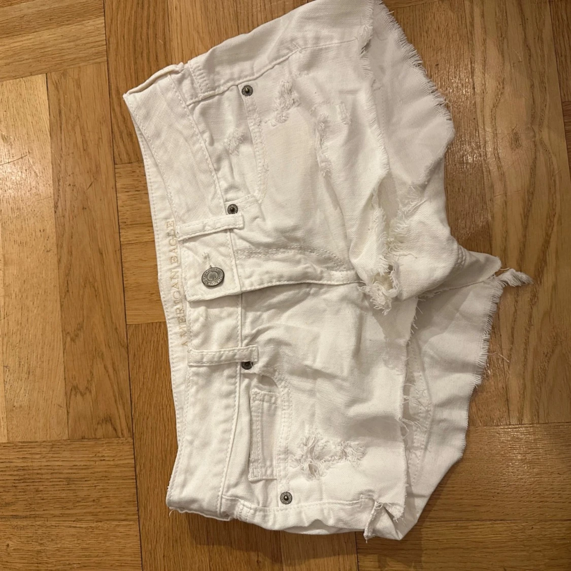 Vita jeansshorts från American Eagle