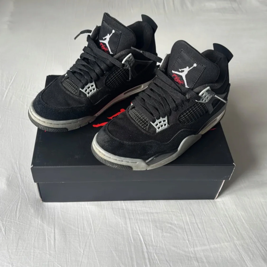 Jordan 4 Retro Black Canvas - 1