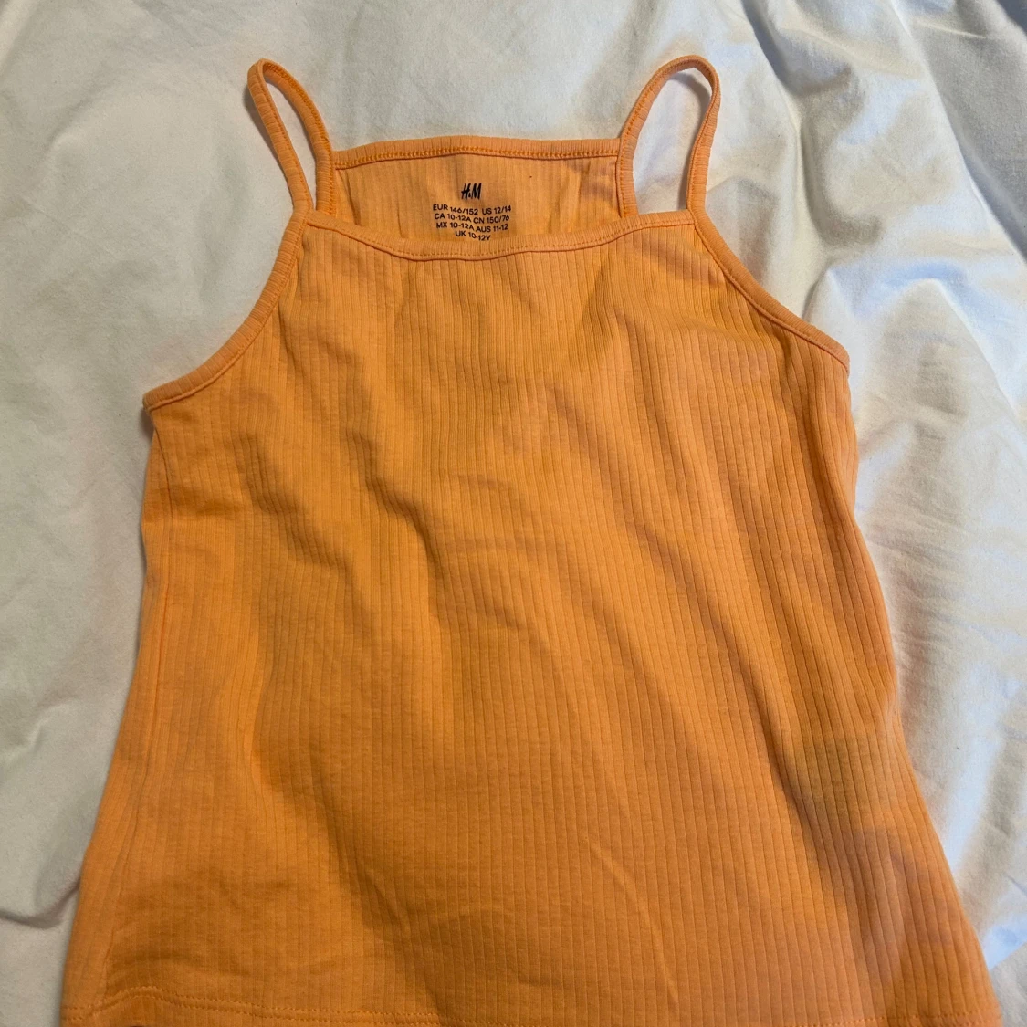 Ribbad orange linnetopp från H&M