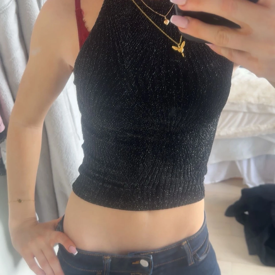 Svart glittrig ärmlös topp - 1