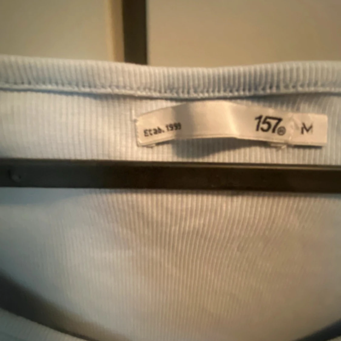 Ljusblå kortärmad topp från 157 - 1