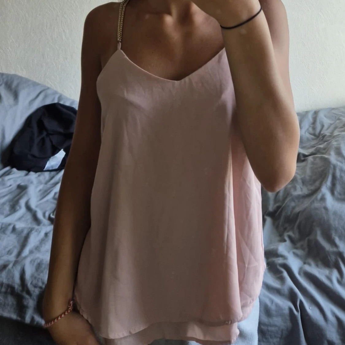 Ljusrosa linnetopp med kedjeband