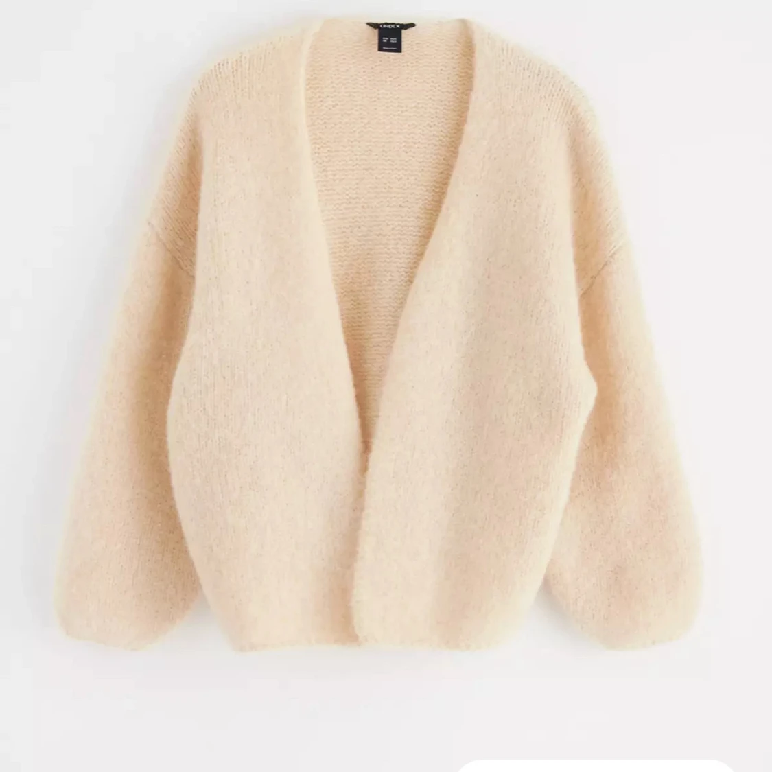 En beige kofta från Lindex