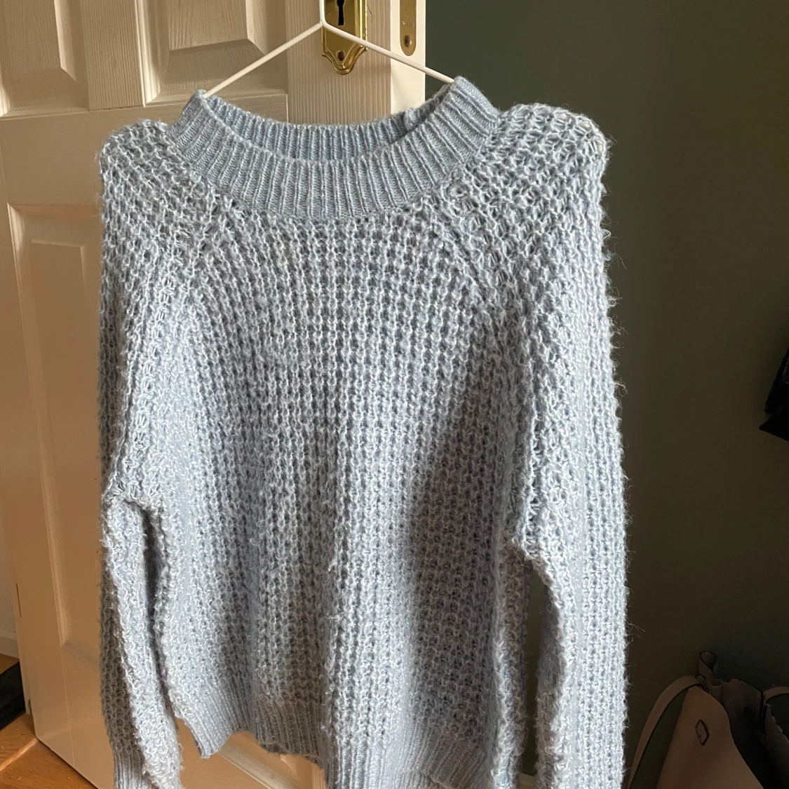 Ljusblå stickad tröja från 157