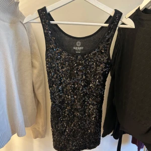 Glittertopp - Snygg glittertopp som inte kommer till användning!