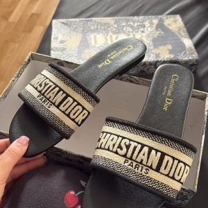 Tofflor - Köpta utomlands. Kartong medföljer.