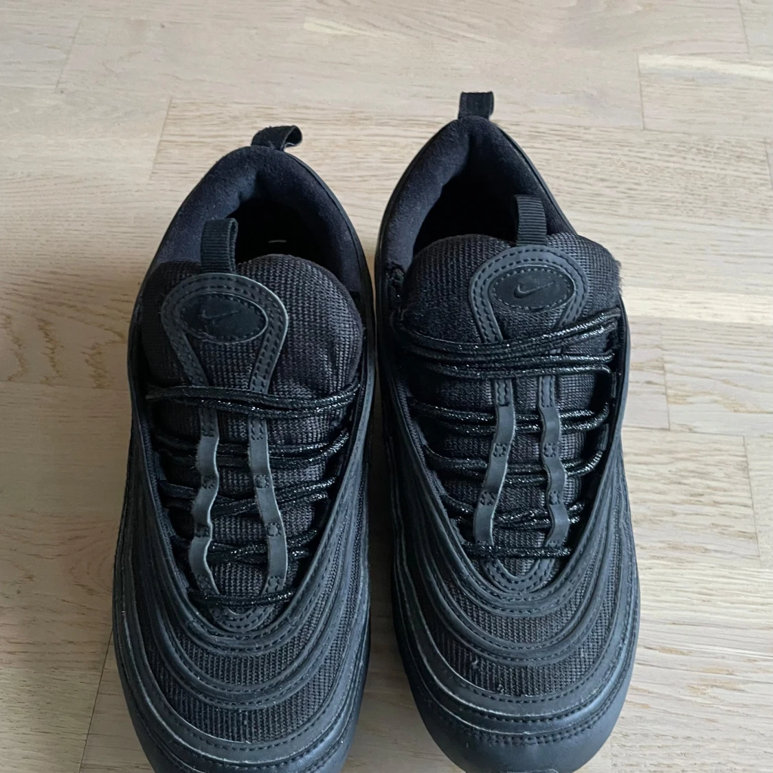 Svarta Nike Air Max 97 sneakers