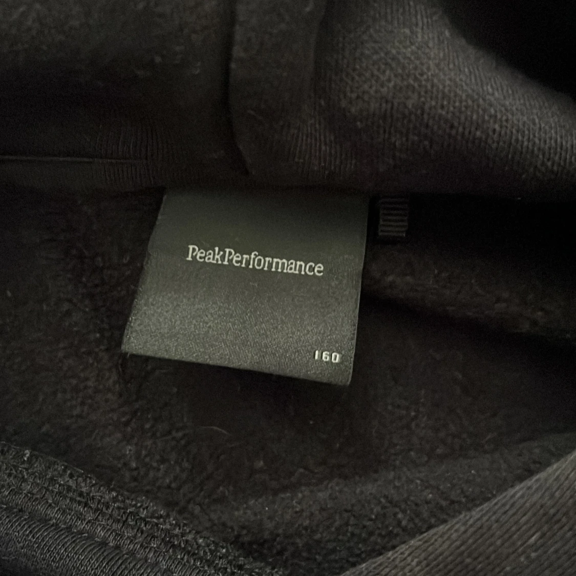 Svart hoodie från Peak Performance - 2