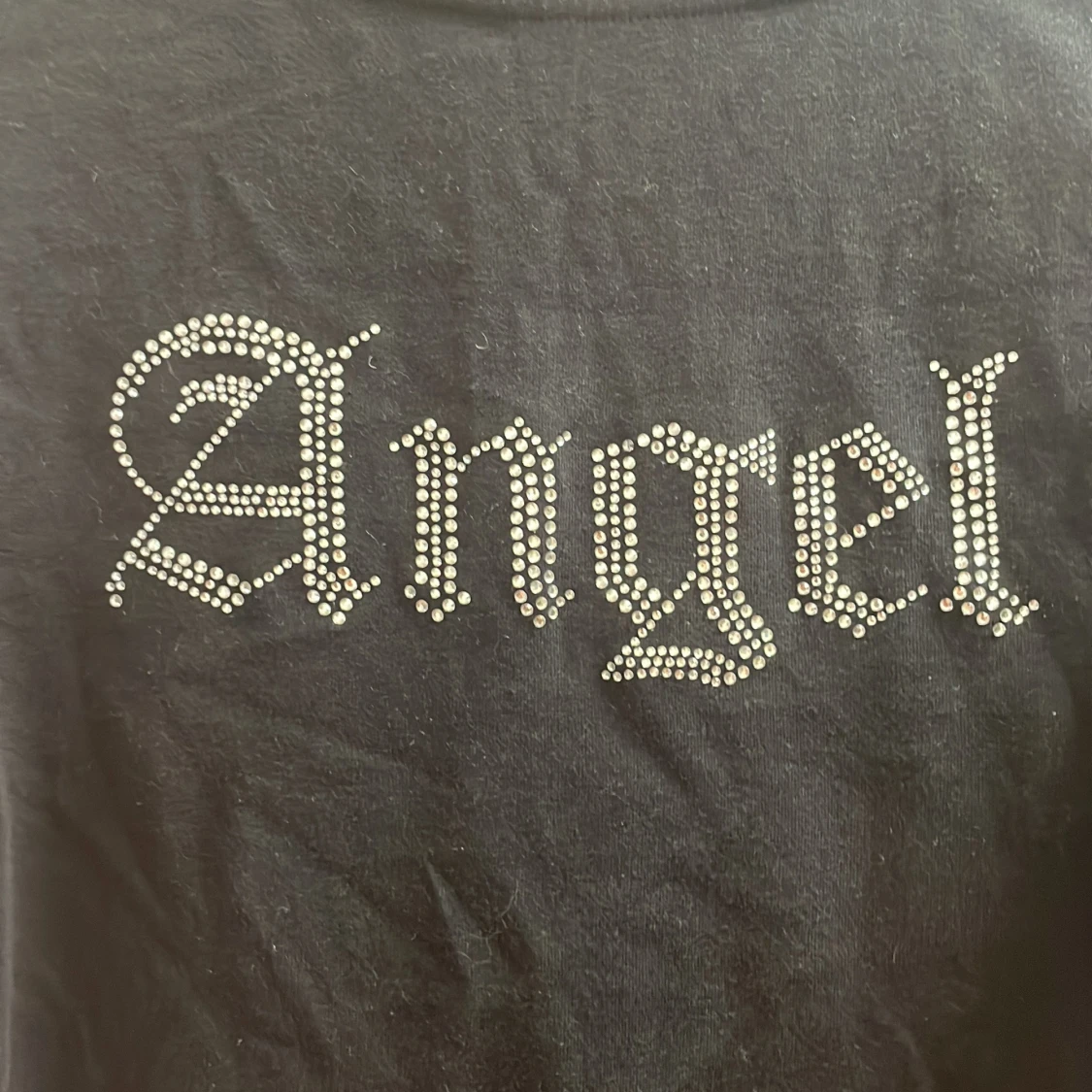 Svart långärmad topp med stenar  - 1