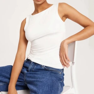 Topp från nelly - Helt ny topp från Nelly med prislappen kvar