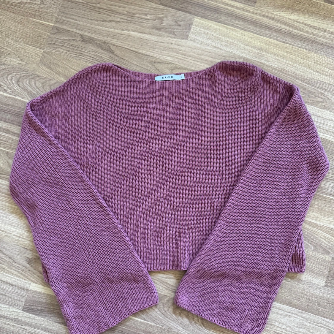 Rosa stickad tröja från NA-KD