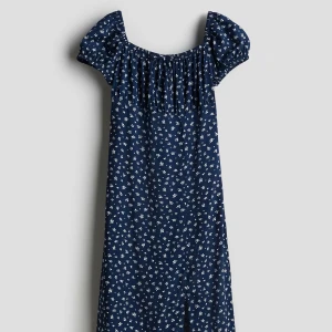 SÖKER MIDIKLÄNNING MED PUFFARM HM - Söker denna midiklänning från hm barn avdelningen helst storlek 170