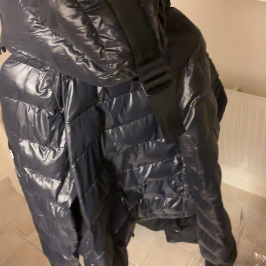 Svart dunjacka Peak Performance - 1