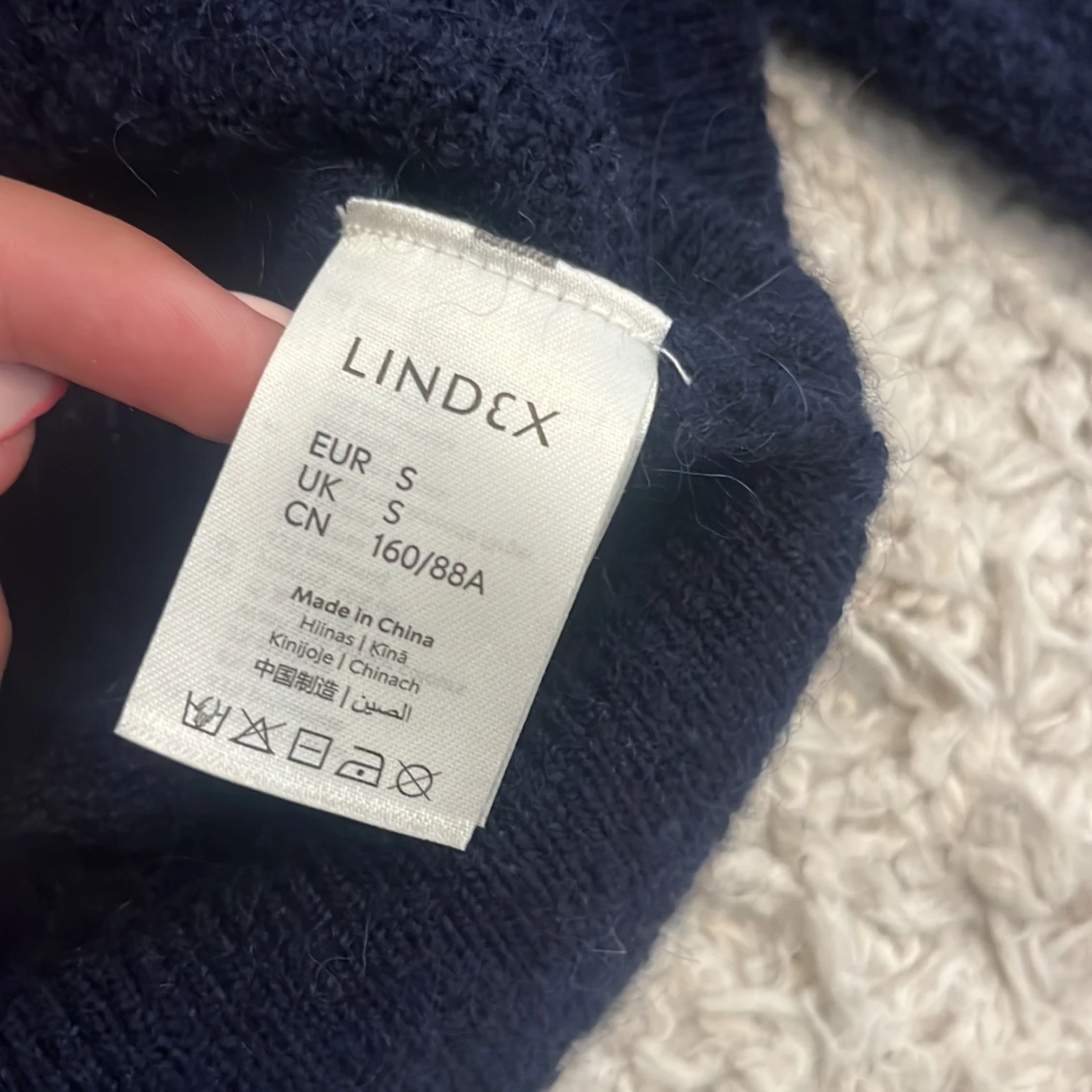 Mörkblå stickad tröja från Lindex - 1