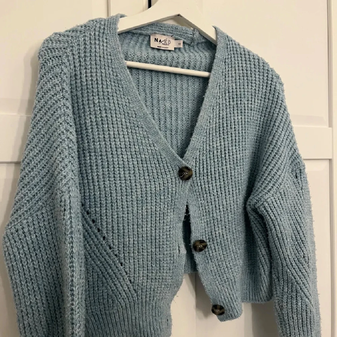 Ljusblå stickad kofta från NA-KD