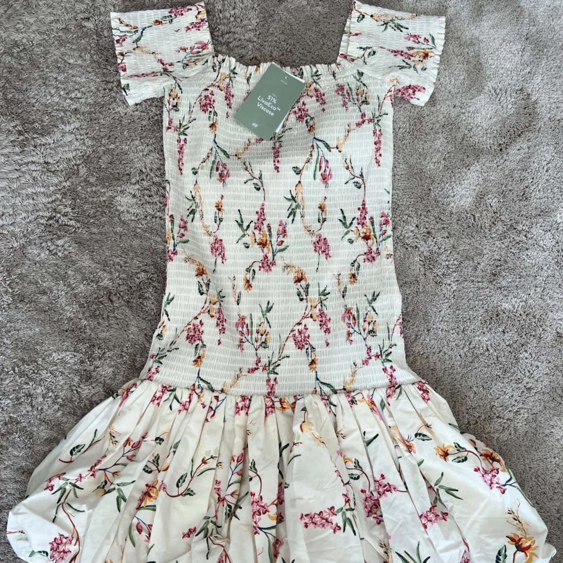 Blommig smockad k länning från hm  - 1