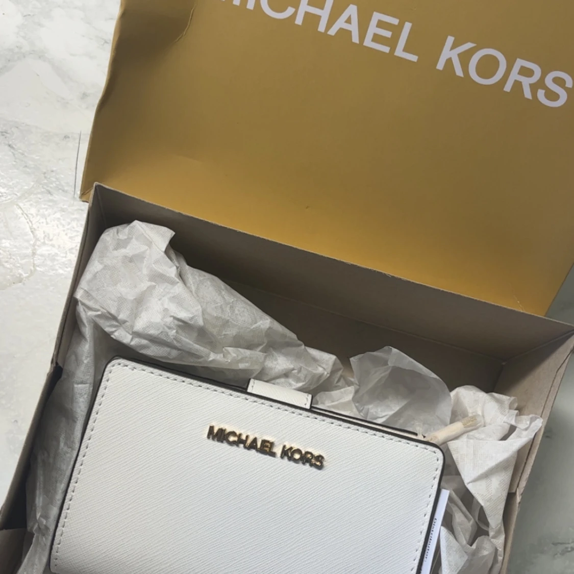 Vit plånbok från Michael Kors