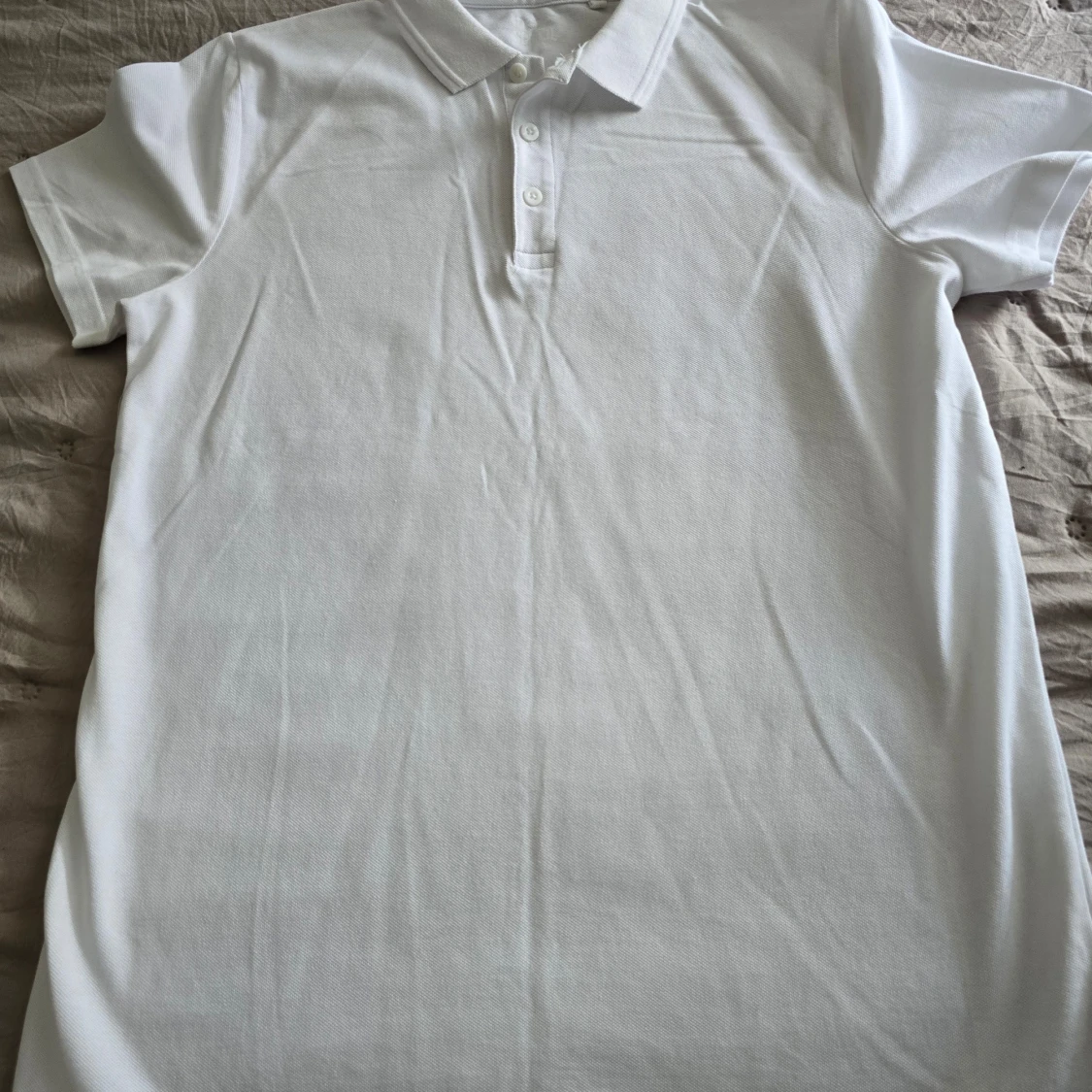 Vit pikétröja från Next School