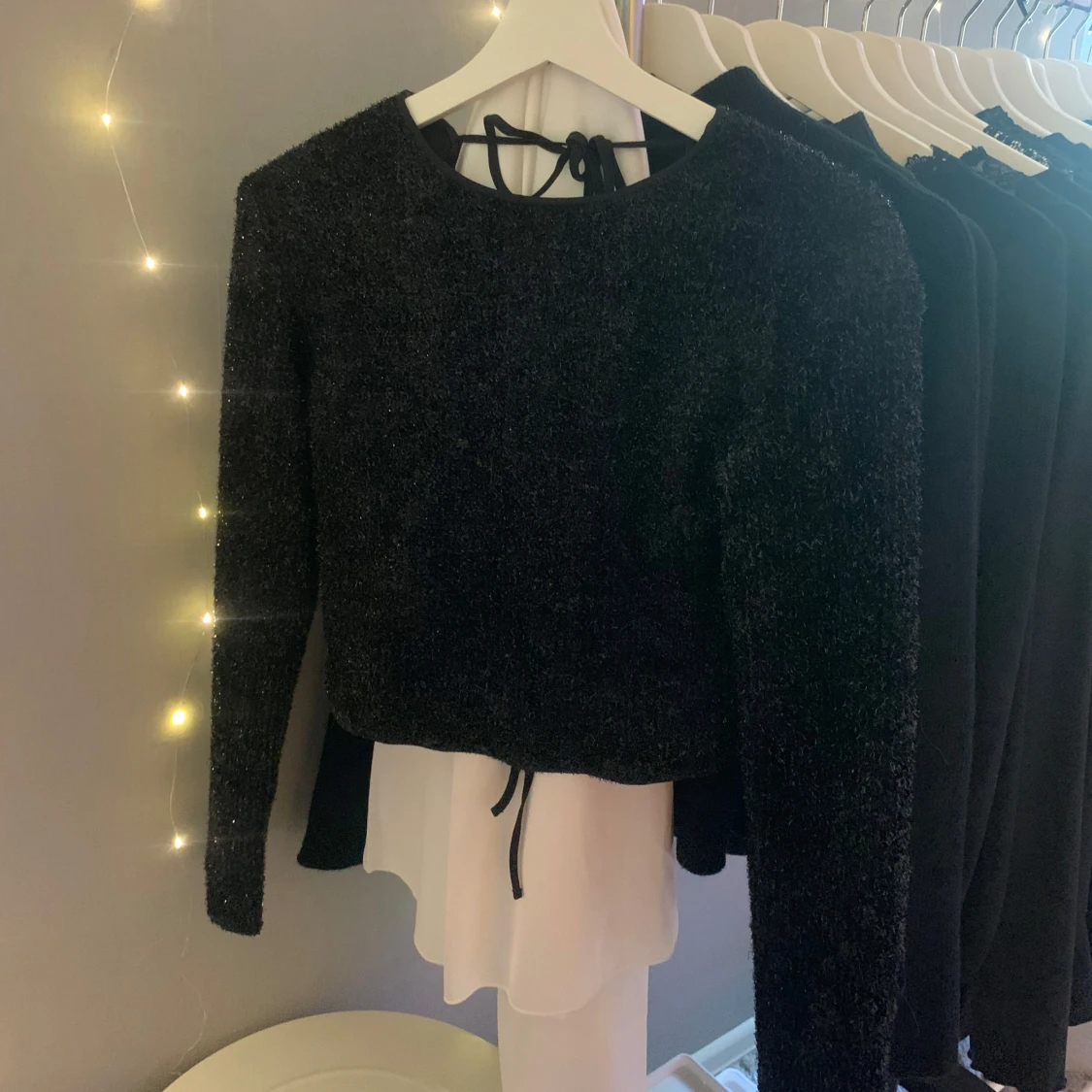 Svart glittrig tröja
