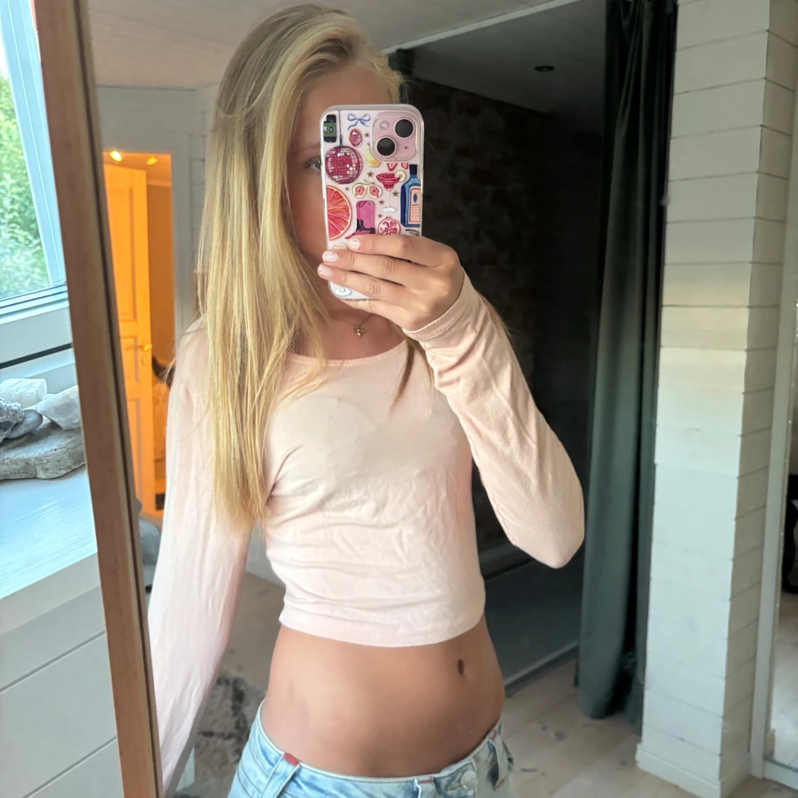 Ljusrosa croppad långärmad topp