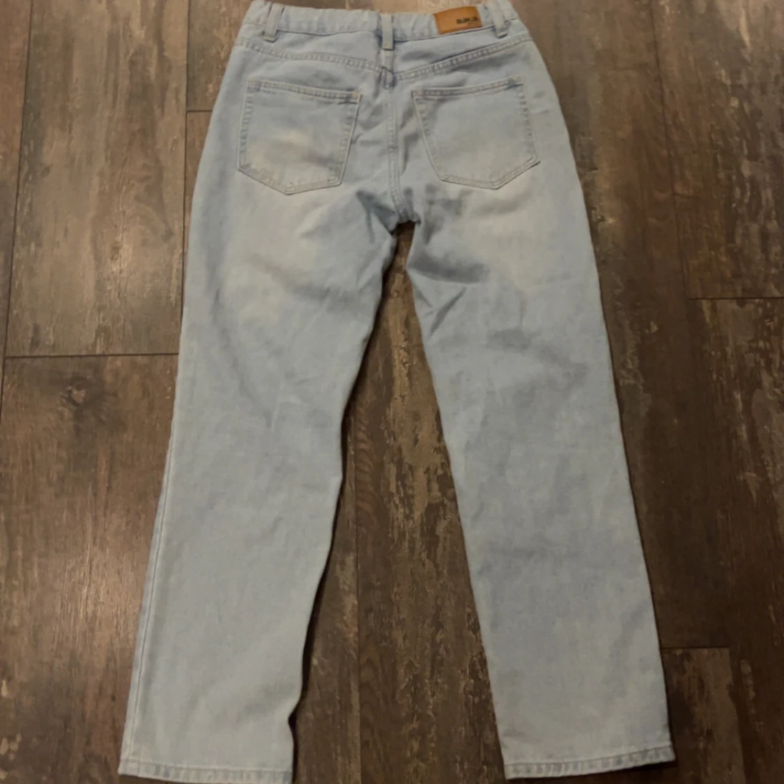 Ljusblå jeansbyxor - 1