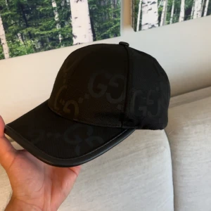 G keps svart  - Helt ny 