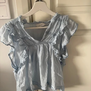 Neo Noir blus - Blus eller topp från neo noir!