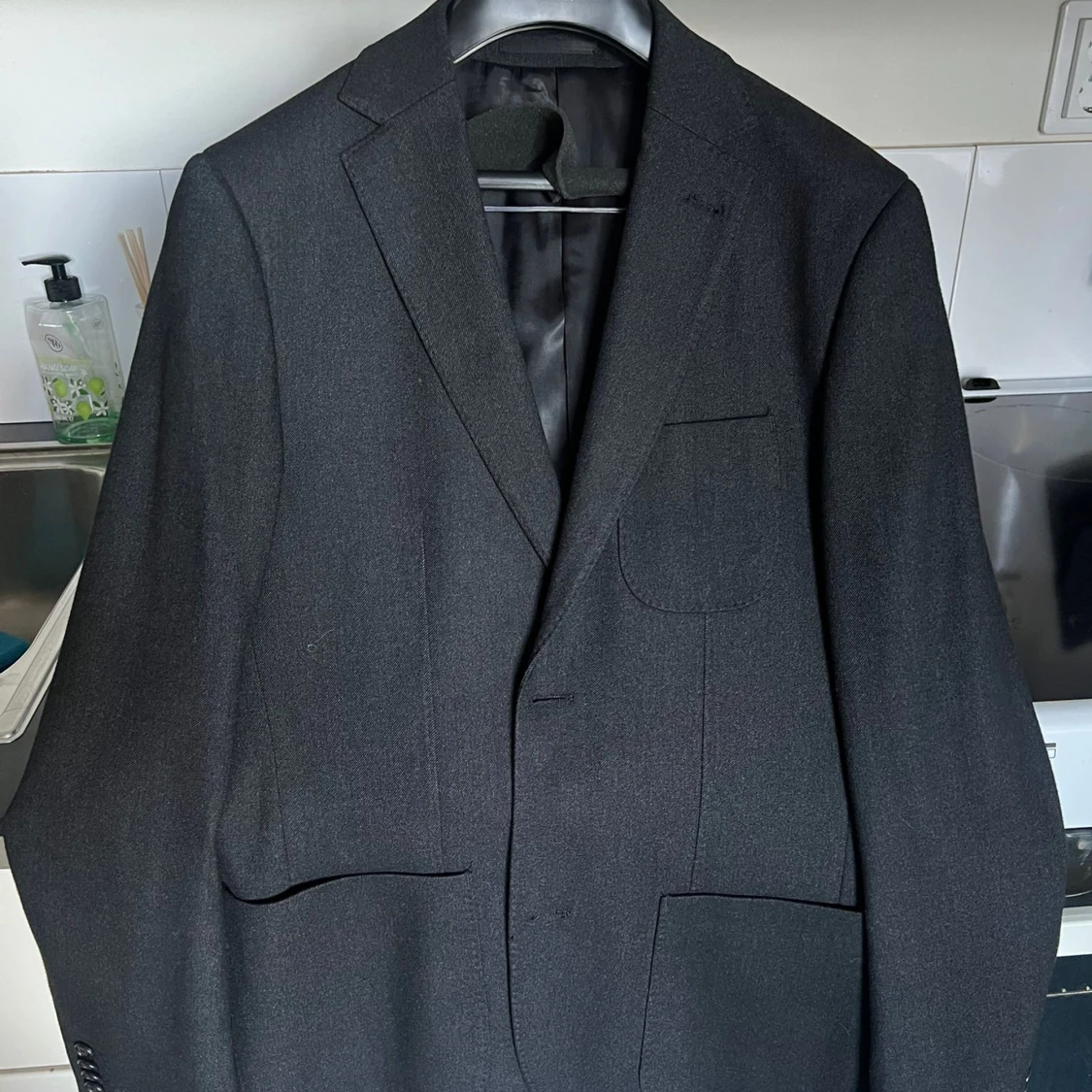 Svart kavaj slim fit från Riley