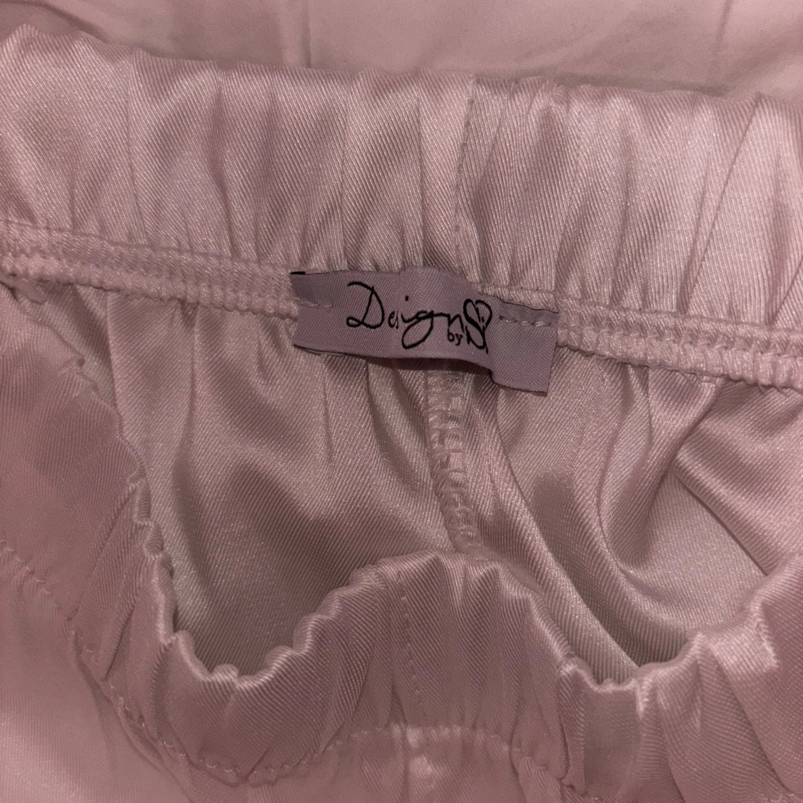 Vita byxor från Design by si - 2