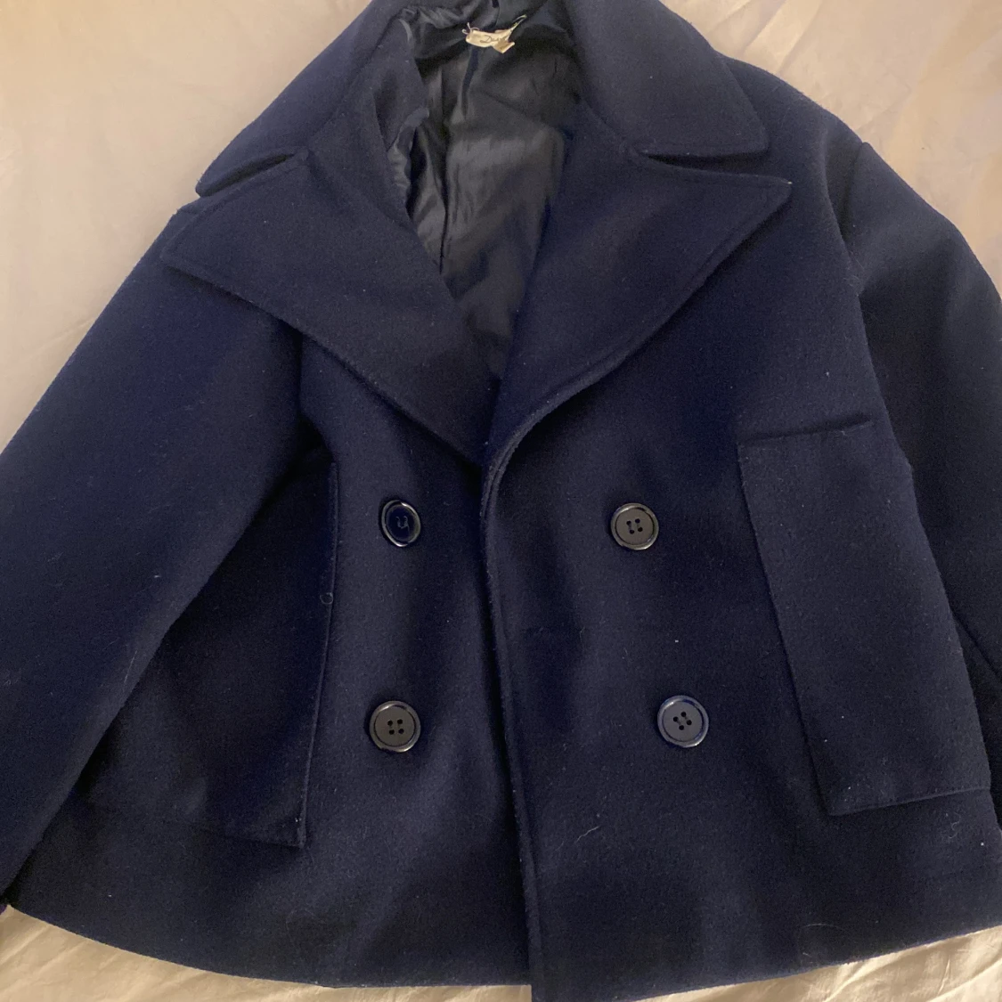 Design by si Marinblå kappa - 1