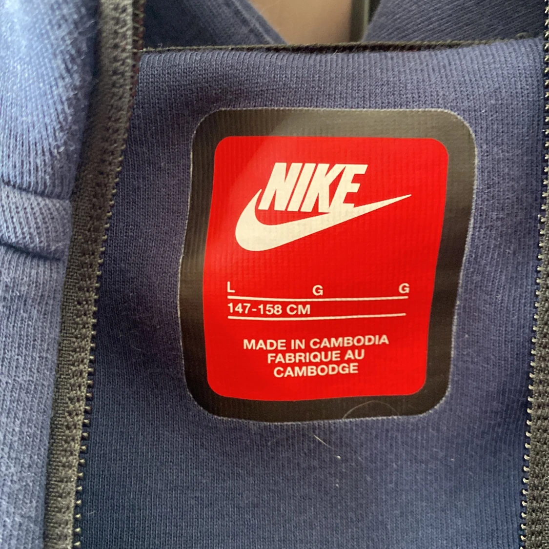 Blå och ljusblå hoodie från Nike - 1